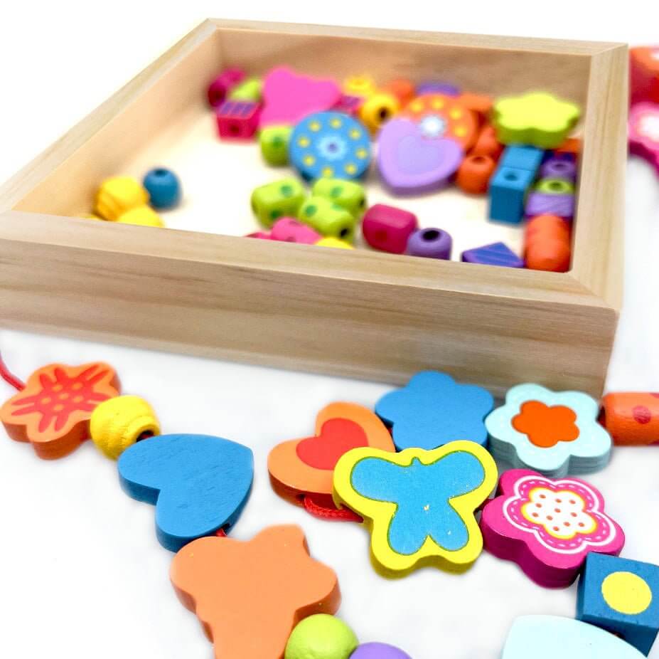 Wooden Bead Hearts & Butterflies Necklace from Blossom & Bloom Kids - Wooden Bead Hearts & Butterflies Necklace - Blossom & Bloom Kids