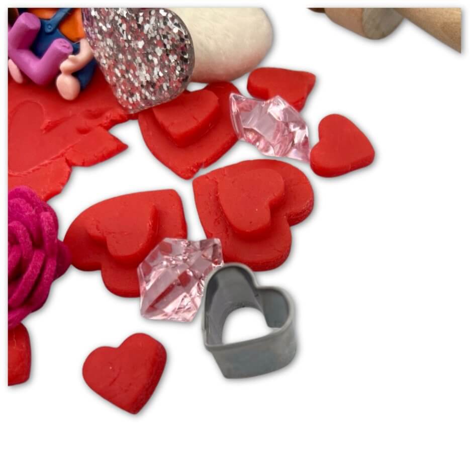 Red playdough hearts and cutter included in All You Need Is Love Bloom Bag from Blossoms & Bloom Kids - All You Need Is L-O-V-E, Playdough Kit - Blossom & Bloom Kids