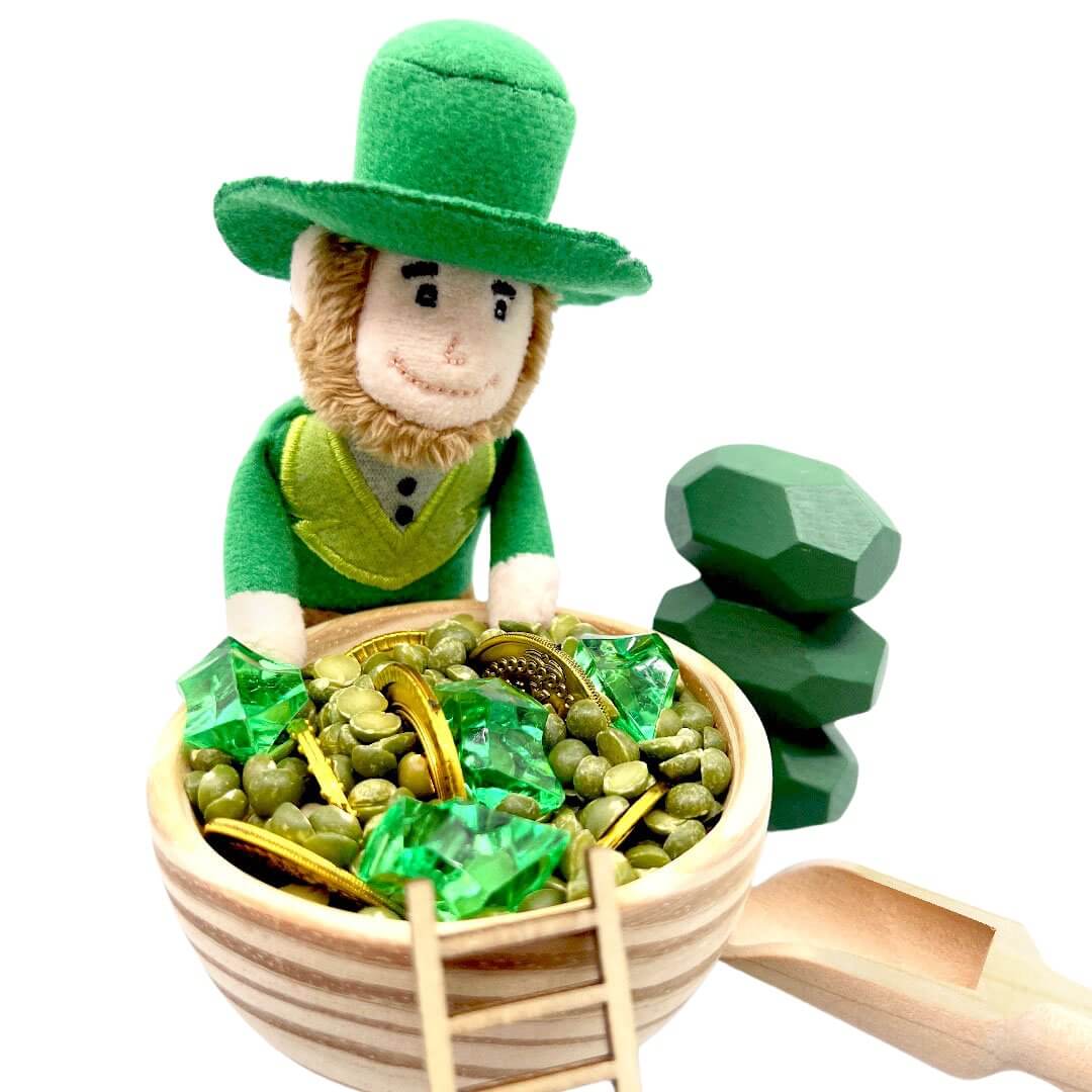Organic Cotton Lucky Leprechaun with pot of gold, mixed with lentils, wooden bowl, ladder, scoop, and stackable stones from Blossom & Bloom Kids - Lucky Leprechaun, Playdough Kit - Blossom & Bloom Kids